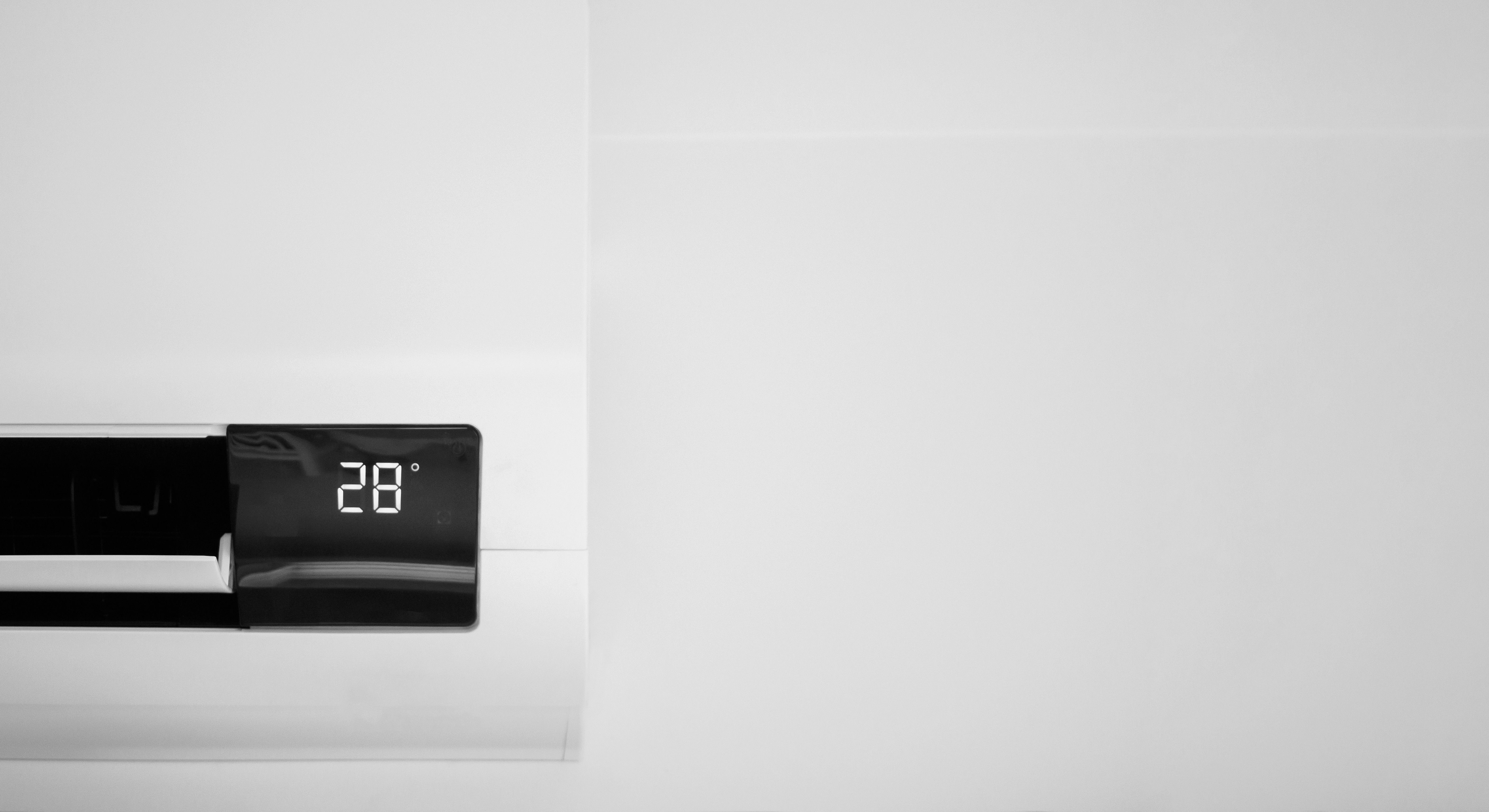 Air conditioner on white wall